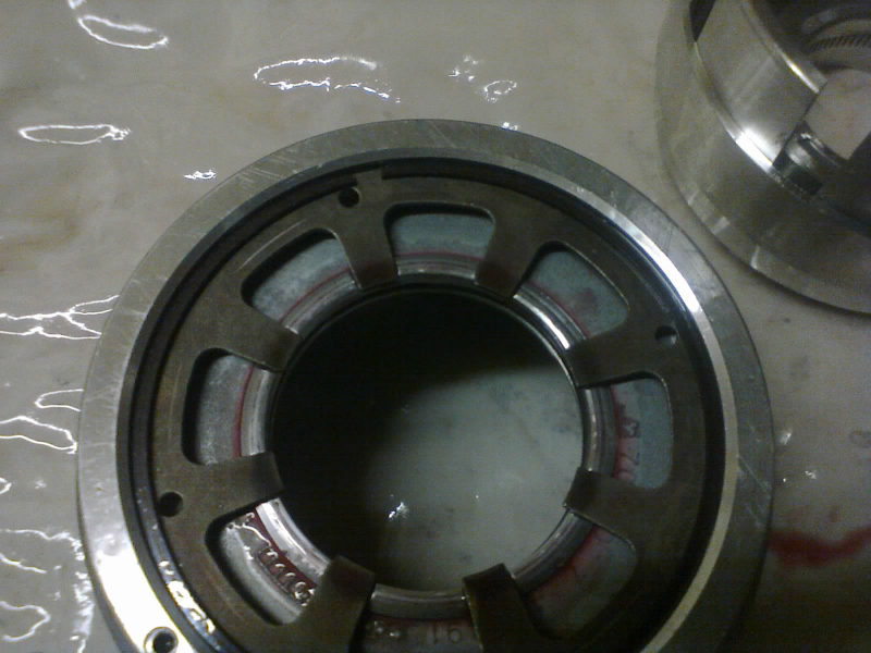 This spring gets pressed back down onto the OD/R piston and held in place by the snap-ring.